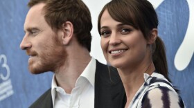 British actor Michael Fassbender and Swedish actress Alicia Vikander pose during a photocall of the movie "The Light Between Oceans" at the 73rd Venice Film Festival on Aug. 31, 2016 at Venice Lido. (Tiziana Fabi/AFP/Getty Images)