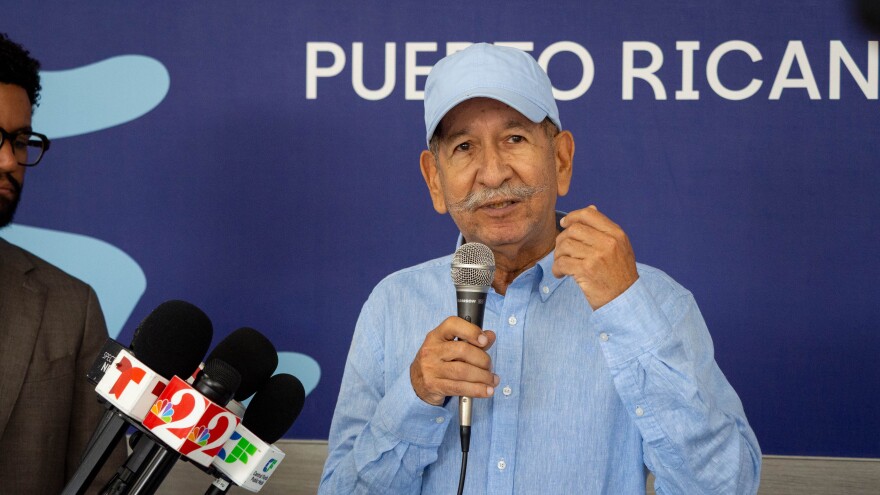 Speaking at the Puerto Rican Taino Bakery in Orlando on Monday, July 6, 2026, William Díaz, the founder of immigration assistance nonprofit Casa de Venezuela, urges the Latino community to register to vote.
