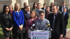 Connor Thonen-Fleck addresses reporters while his parents stand by his side, March 11, 2019, in Durham, N.C.