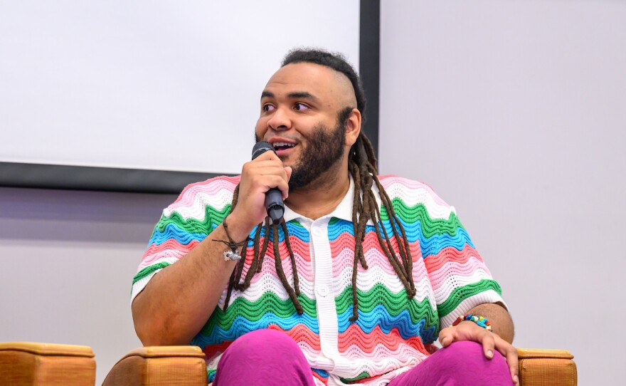Victor Davila from Slingshot answers audience questions at the 4th annual By Degrees Climate Summit on Friday, May 8, at Manchester Community College.