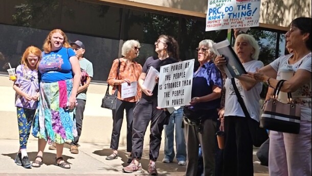 Protesters gathered outside a Public regulation Commission meeting on June 18 to submit public comment against the proposed acquistion of TXNM energy, the Public Service Company of New Mexico's parent company, by Blackstone infrastructure. Protesters said the controversial stock sale between the companies shows they don't respect New Mexico's laws, and they urged the PRC to reverse the sale and deny the acquisition application.
