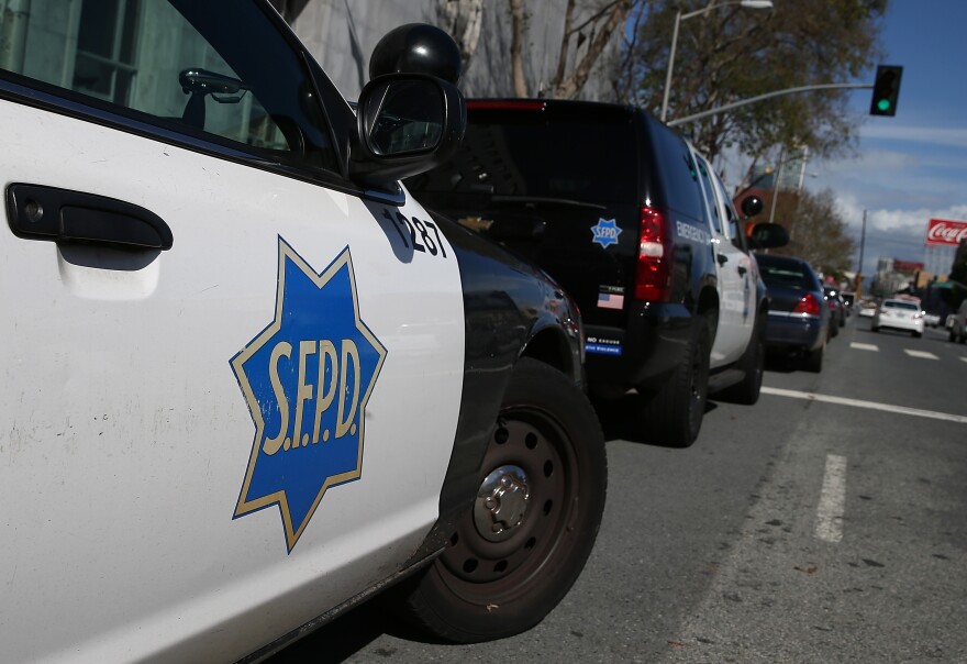 San Francisco police cars sit parked in front of the Hall of Justice in 2014 in San Francisco, Calif.