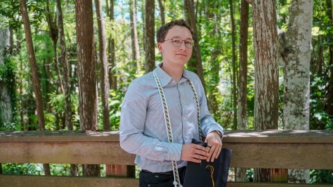 Anthony Zarczynski poses for a graduation photo earlier this year spring. Zarczynski, who graduated from the University of Central Florida this spring with a degree in digital media, has been navigating an especially challenging job market as generative AI upends the entry-level job market for recent college graduates.