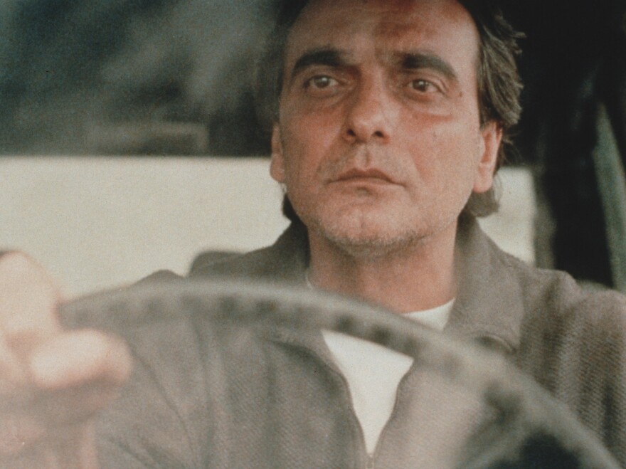 Kiarostami's <em>Taste of Cherry</em> won the Palme d'Or at the 1997 Cannes Film Festival. It follows a man (Homayoun Ershadi) who is contemplating suicide and drives around Tehran looking for someone to bury him.