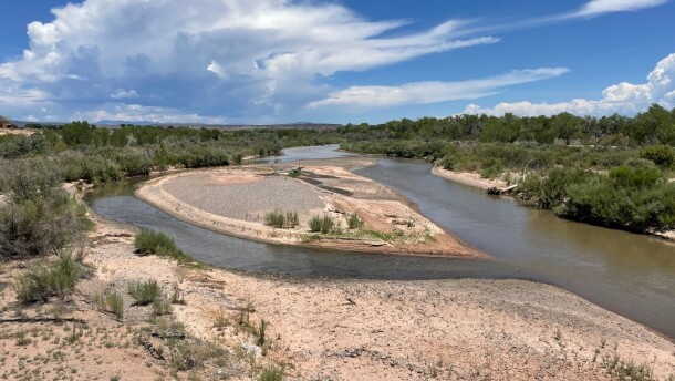 Sand and gravel bars in the Rio Grande expand in the river's reach through central New Mexico as monsoon clouds form north of Bernalillo, N.M., on Thursday, July 21, 2022. (AP Photo/Susan Montoya Bryan)
