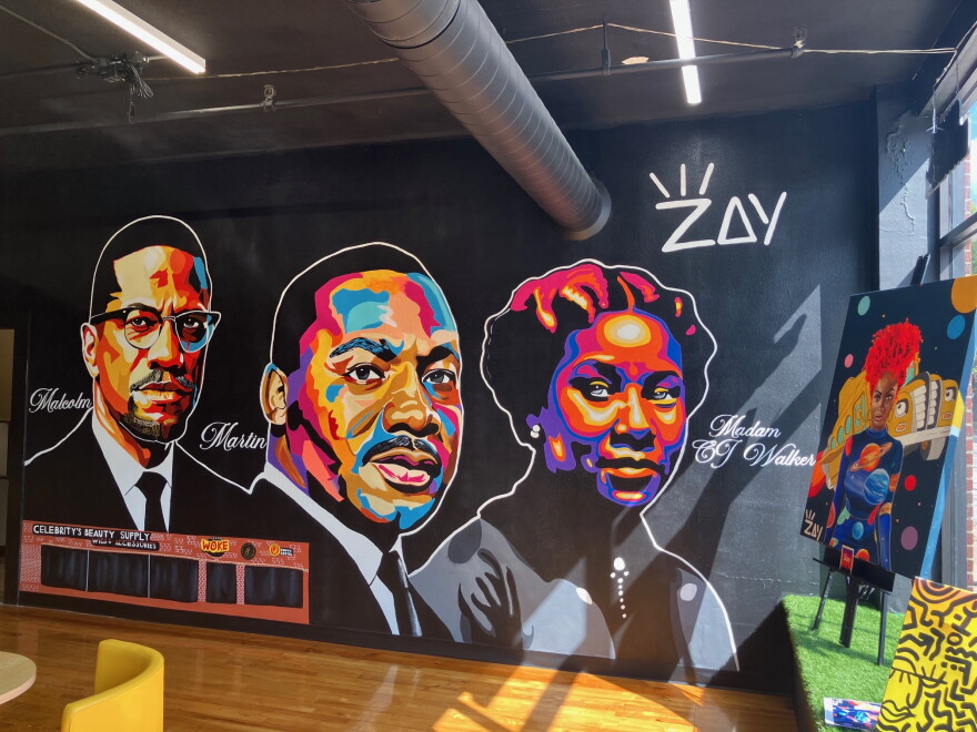 Zay Williams's mural of civil rights leaders, done in 2025, inside Celebrity's Beauty Supply, 1600 Harrison St., Davenport.