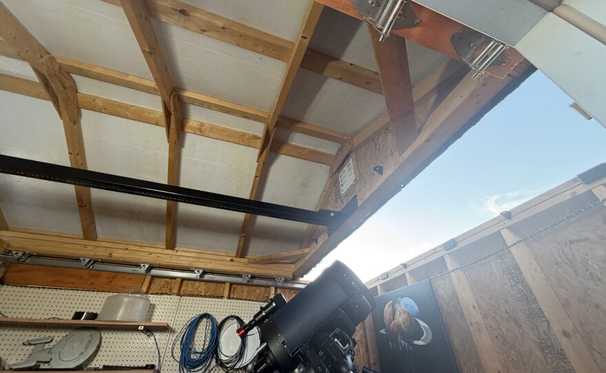 A garage door opener operates the roof of the observatory.