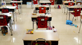 FILE - In this Thursday, March 11, 2021 file photo, desks are arranged in a classroom at an elementary school in Nesquehoning, Pa.