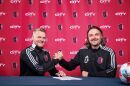  St. Louis City SC head coach Bradley Carnell and St. Louis SC sporting director Lutz Pfannenstiel pose for a photo during Carnell's contract signing.