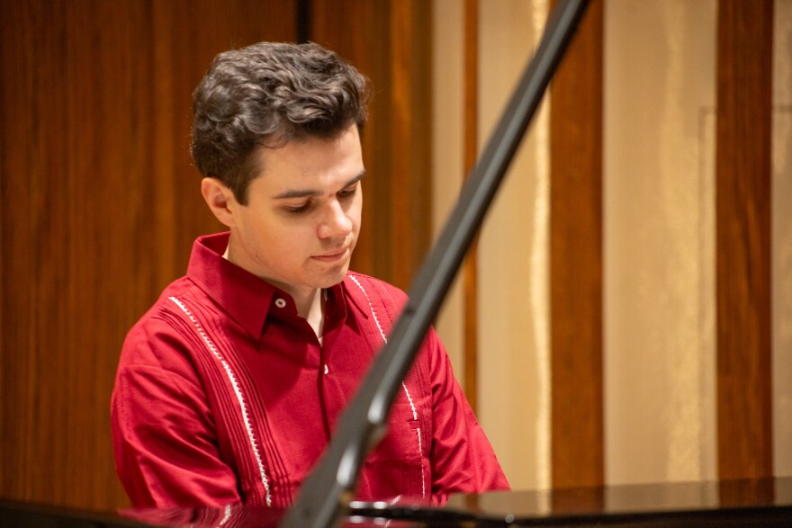 Andreas Landstedt playing piano