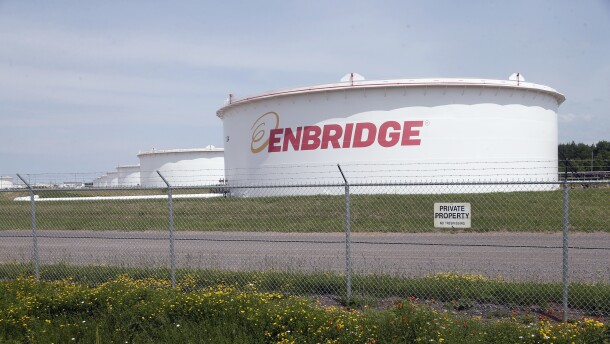 FILE - The corporate name stands out on tanks shown Friday, June 29, 2018 at at the Superior terminal of Enbridge Energy in Superior, Wis.