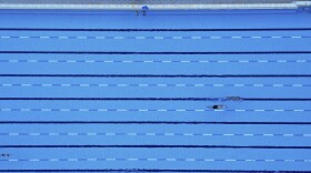 An aerial photograph taken by drone shows swimmers practicing at Alimos Municipal Swimming Pool, south of Athens, Greece, Thursday, Jan. 16, 2025. (AP Photo/Thanassis Stavrakis)