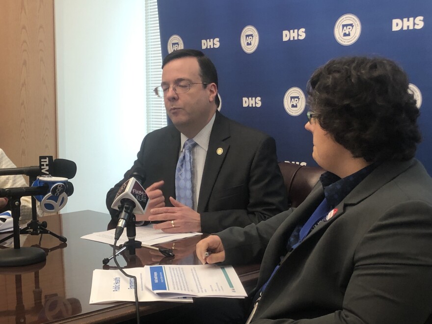 Mark White, secretary of the Arkansas Department of Human Services, speaks with reporters alongside DHS Deputy Director for Health and State Medicaid Director Dawn Stehle on Friday, Nov. 4, 2022.