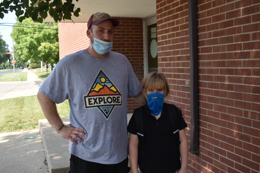 Mattalyn Sears and her father, Matthew, outside Whittier Primary School.