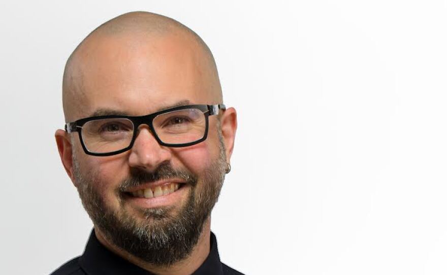 Close up of man smiling into camera