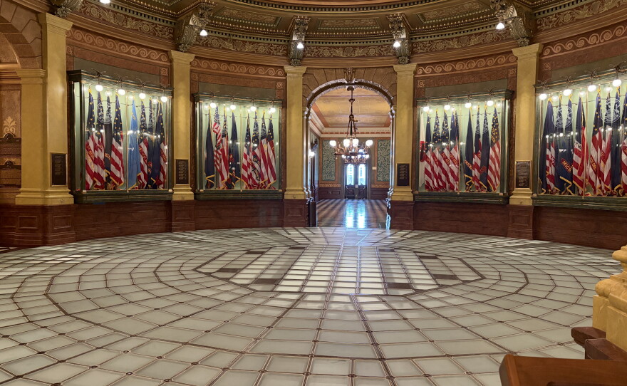 The glass floor room of the capitol. Page said in 2023-2024 the Michigan State Capitol Commission restored the dome above the glass floor.