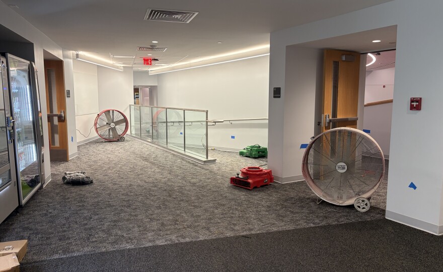 Cleaning crews at work at ISU's Center for the Visual Arts, which was hit with water damage.