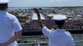 Sailors from the USS Eisenhower man the rails coming into Norfolk. 