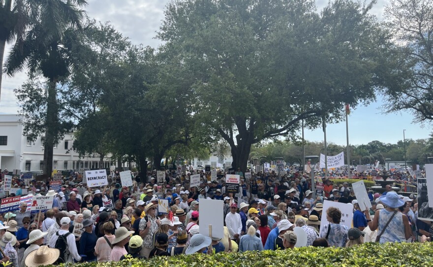The largest crowd yet gathered for the No Kings III protest in front of the Collier County Courthouse. The crowd reached from the front of the courthouse to nearly the edge of the grass near the parking lot. People carried vivid signs expressing their displeasure with the Trump administration. More than any other No Kings demonstration, people seemed really fed up today.