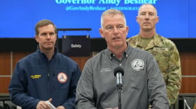 Kentucky EMA Director Eric Gibson giving a briefing on flood recovery and the incoming winter storm