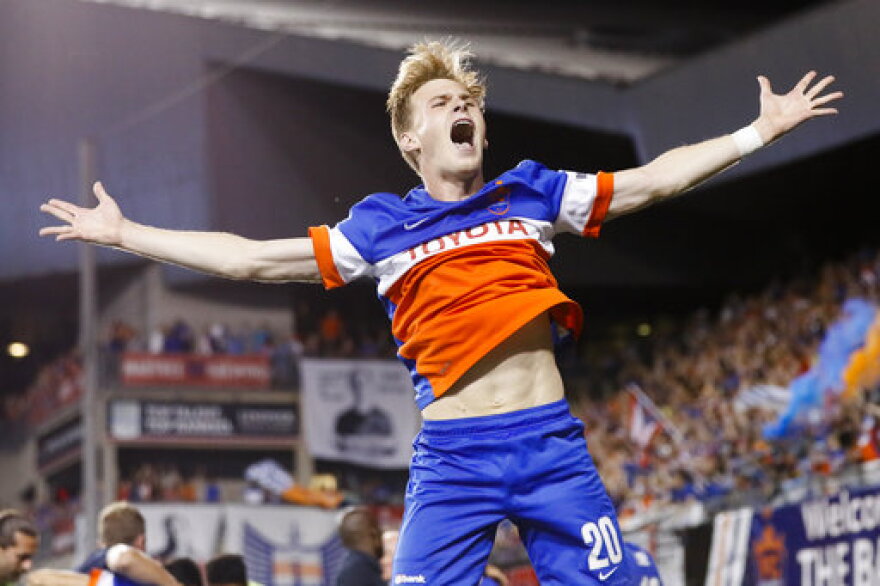 FC Cincinnati midfielder Jimmy McLaughlin reacts after winning the penalty shoot-out during a U.S. Open Cup soccer match in Cincinnati against the Chicago Fire.