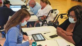 FEMA Disaster Survivor Assistance teams register applications for relief from victims of Hurricane Ian at an Intake Center in Seminole County.