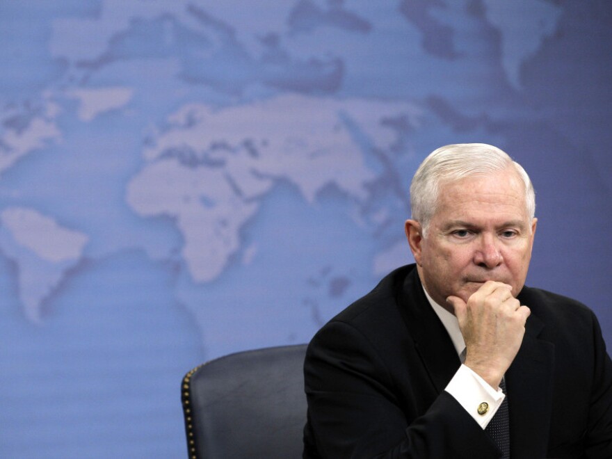 Defense Secretary Robert Gates listens to a reporter's question during a news briefing about gays in the military Tuesday at the Pentagon.