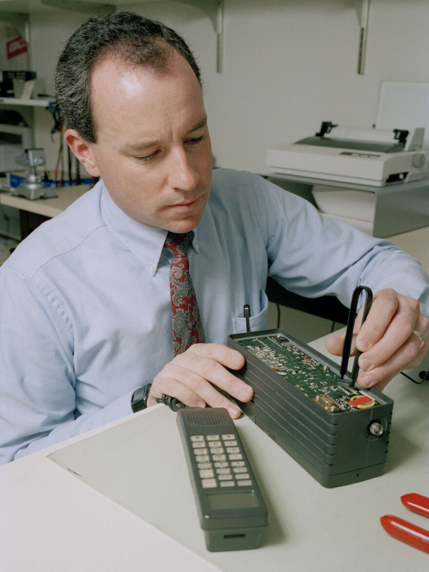 A phone number assignment is inserted into a cellular phone in California in January 1992.