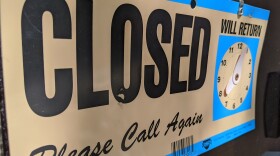 A closed sign on a business
