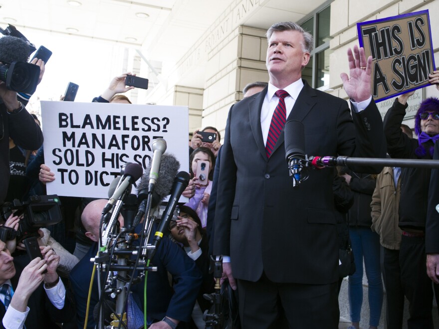 Kevin Downing, Paul Manafort's attorney, leaves federal court after Manafort's sentencing hearing in Washington on Wednesday.