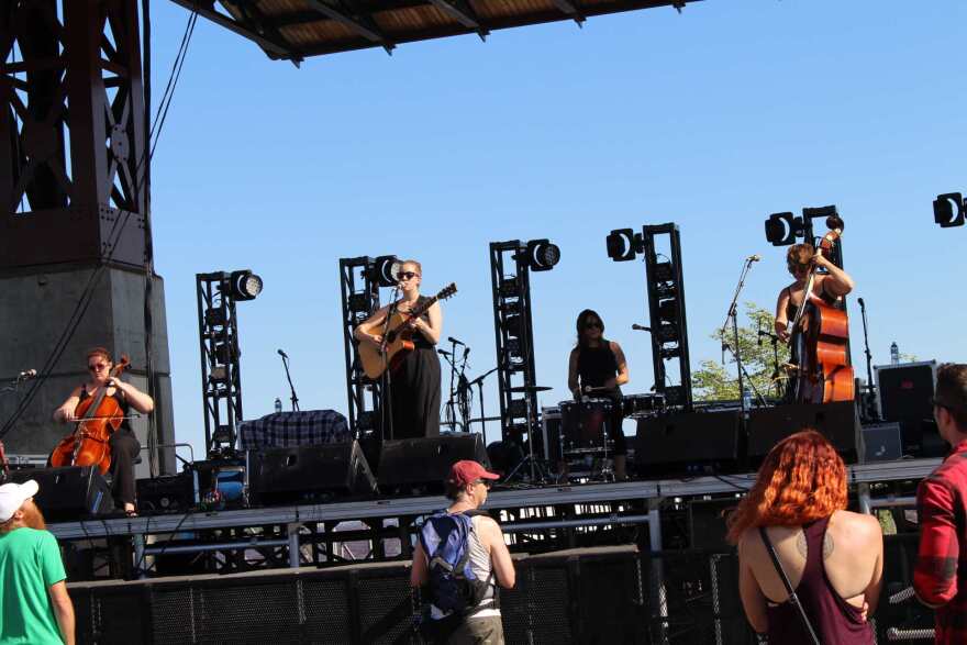 Band playing on an outdoor stage