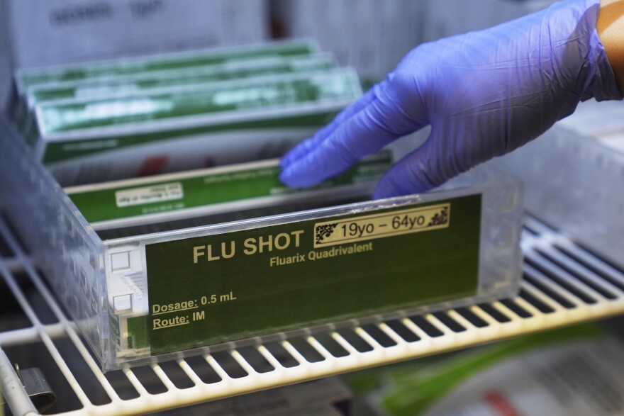 Boxes of Fluarix flu vaccines are seen in storage at International Community Health Services, Wednesday, Sept. 10, 2025, in Seattle.