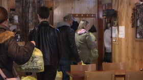 Volunteers heading out with food for those in need.