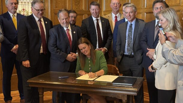 Gov. Sarah Huckabee Sanders signs the state budget for fiscal year 2027 at the Arkansas State Capitol on April 29, 2026.