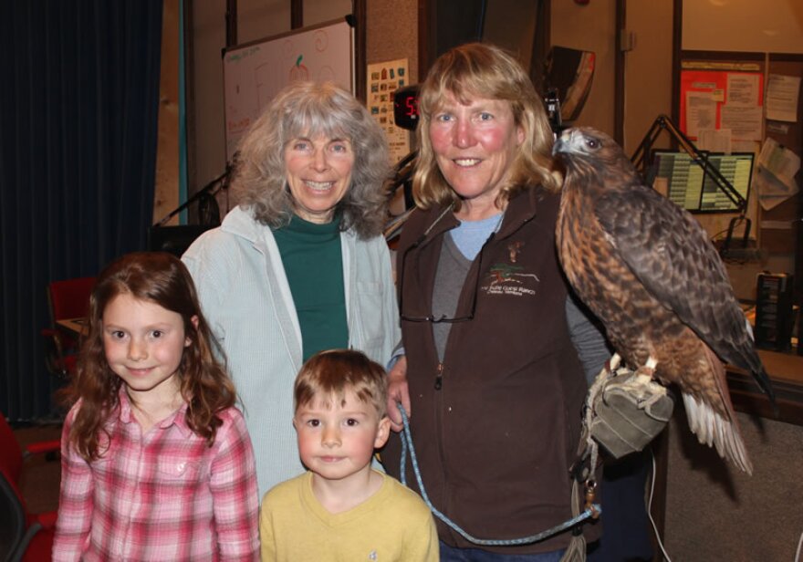 Anne Garde, Kate Davis, Adaline and Weston Schick at the MTPR studios with one of Kate's falcons.