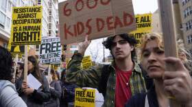 Protesters gather at Foggy Bottom Metro in Washington in support of Palestinians and to call for a permanent ceasefire in Gaza. (Susan Walsh/AP)
