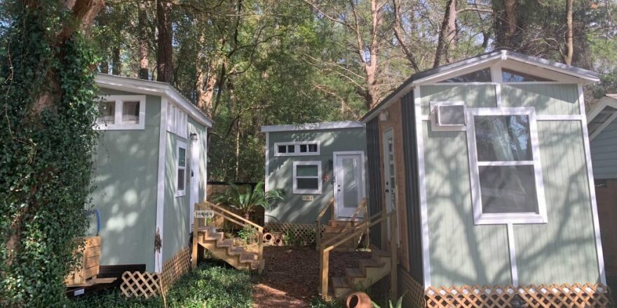 Three tiny homes next to each other