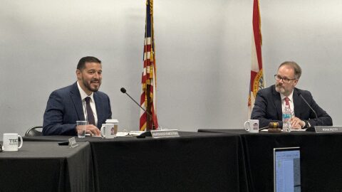 Florida Education Commissioner Anastasios Kamoutsas, left, gives the commissioner’s update during a Jan. 21, 2026, Board of Education meeting at Tallahassee State College. Chair Ryan Petty is sitting on the right.