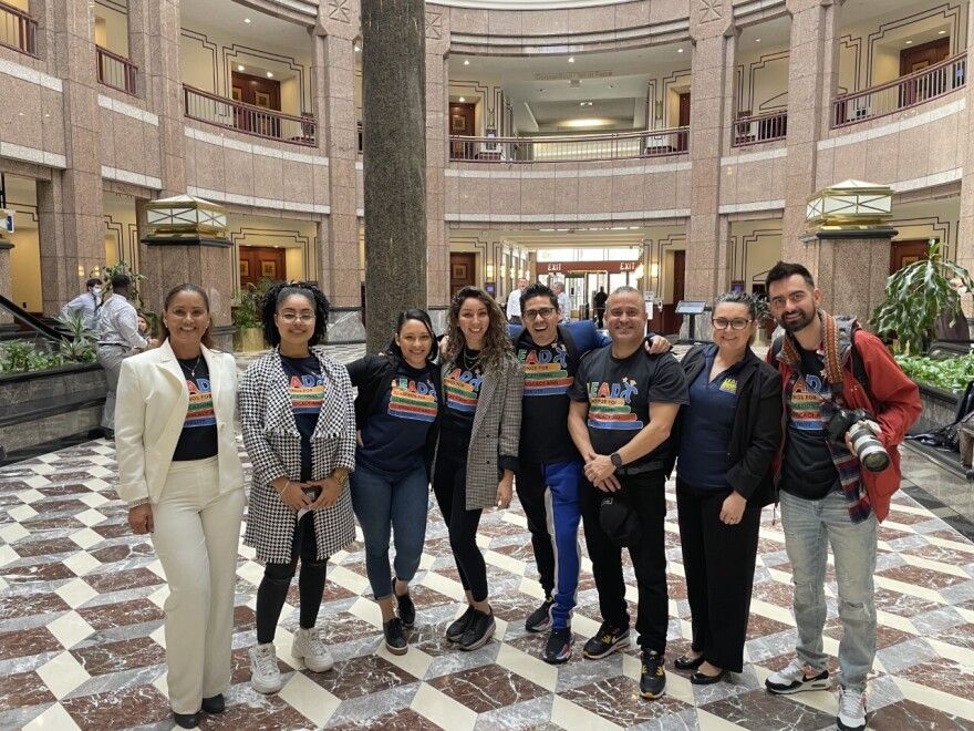 Lucas Pimental and Sandra Ferreira, leadership of Latinos for Educational Advocacy and Diversity, known as LEAD,  rally at the state Capitol on Thursday.