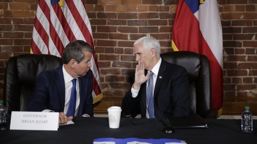 In his most significant political break with former President Donald Trump to date, former Vice President Mike Pence will rally with Georgia Gov. Brian Kemp the day before a May 24 primary. Trump is backing Kemp's rival, former Sen. David Perdue. Pence and Kemp are shown here in 2020.