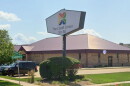 The exterior of a bank. specifically, Credit Union For All's location on Eastland Drive in Bloomington.