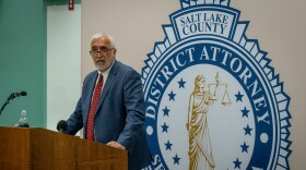 Salt Lake County District Attorney Sim Gill announces charges in the June No Kings shooting at his office in Salt Lake City, Dec. 3, 2025.