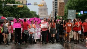 In July, abortion rights advocates marched in Austin, Texas, to protest legislation that could shut down all but five abortion clinics and restrict abortion rights throughout the state.