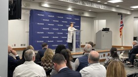 Dr. Christine Alexander-Rager addresses staff during her annual State of the System speech. She said employee sacrifices last year helped the system stabilize its finances.