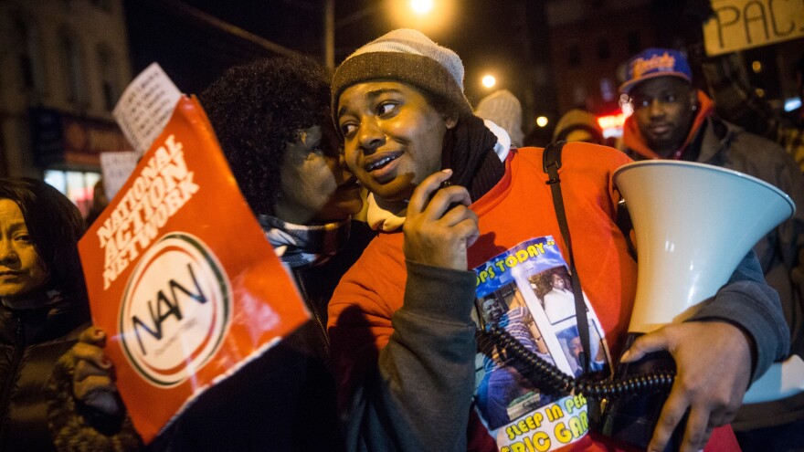 Erica Garner, daughter of Eric Garner, leads a 2014 protest against the grand jury's decision not to indict a police officer involved in the chokehold death of Eric Garner. Erica Garner, now 27, has been hospitalized after a heart attack, her mother tells the New York Times and New York Daily News.