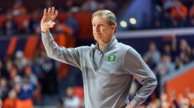 FILE - Oregon head coach Dana Altman motions to his team during an NCAA college basketball game against Illinois, March 3, 2026, in Champaign, Ill. (AP Photo/Craig Pessman, File)