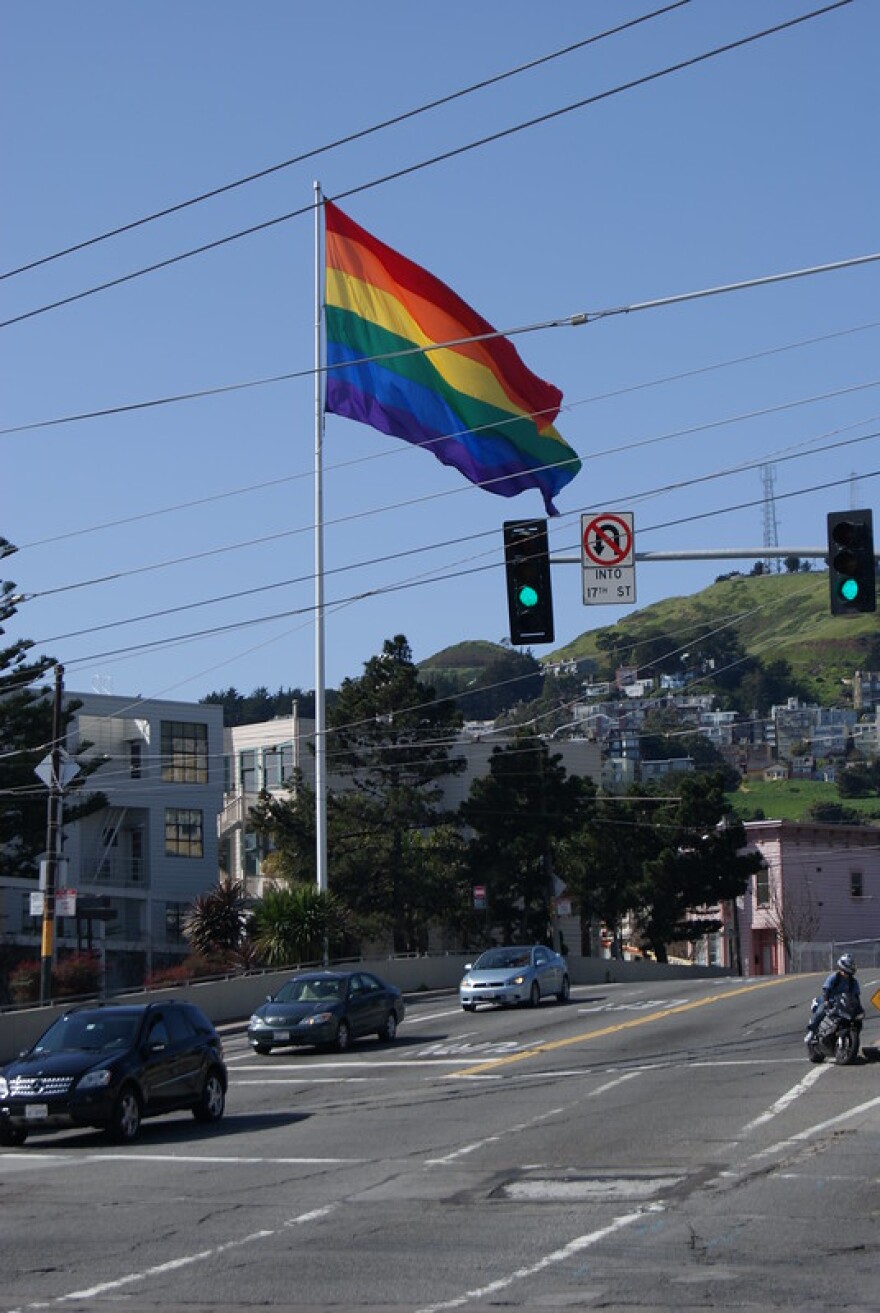 A rainbow flag waves over the Castro District