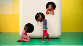 Children play at the opening of artist Carsten Holler's installation 'Gartenkinder.'
