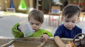 Water play is a popular feature in their outdoor space