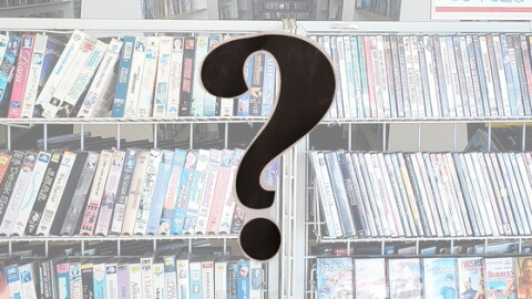 Long shelves of VHS tapes with a question mark in the foreground